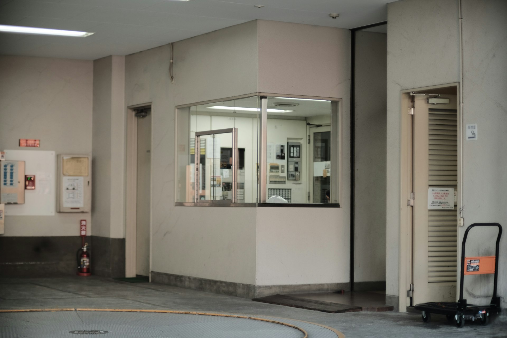 a luggage cart is parked in front of a building